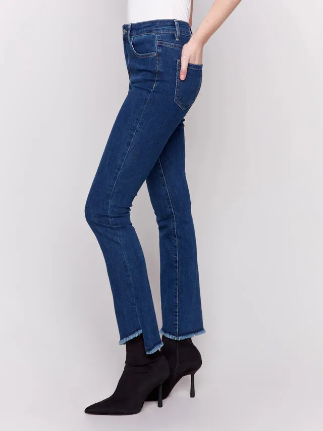 BOOTCUT JEAN WITH ASYMETRICAL HEM