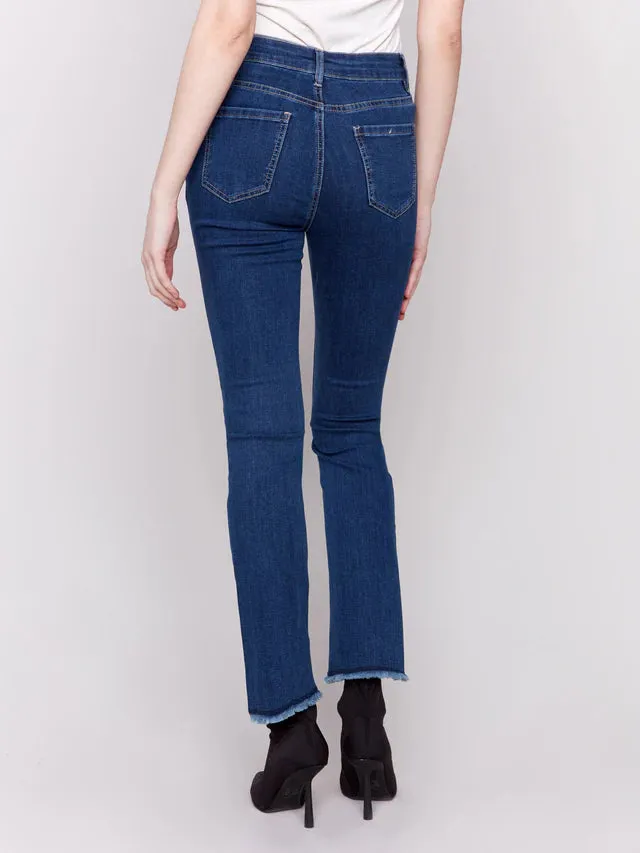 BOOTCUT JEAN WITH ASYMETRICAL HEM