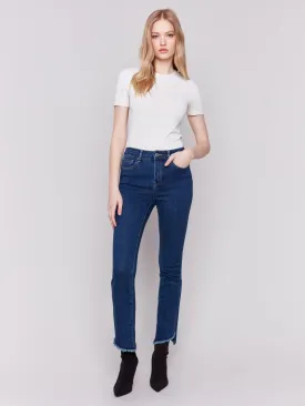 BOOTCUT JEAN WITH ASYMETRICAL HEM