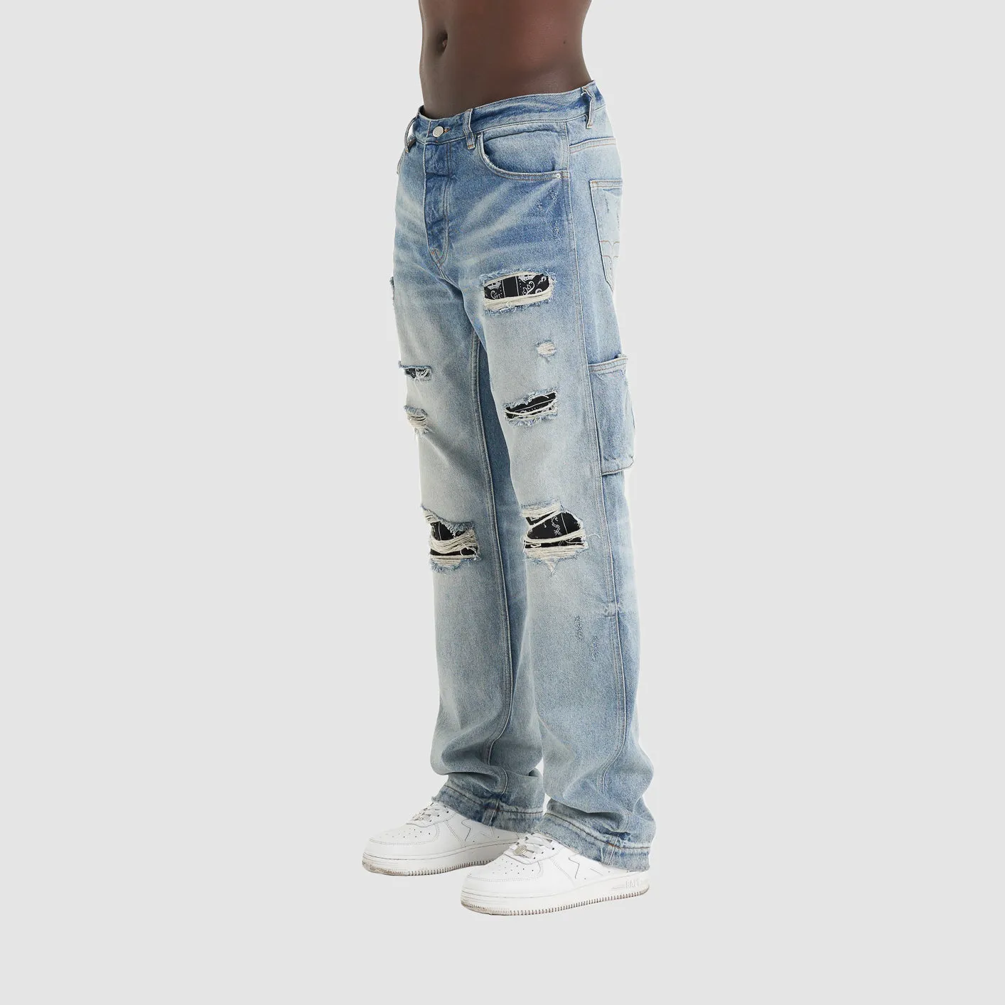 DISTRESSED DENIM PANTS