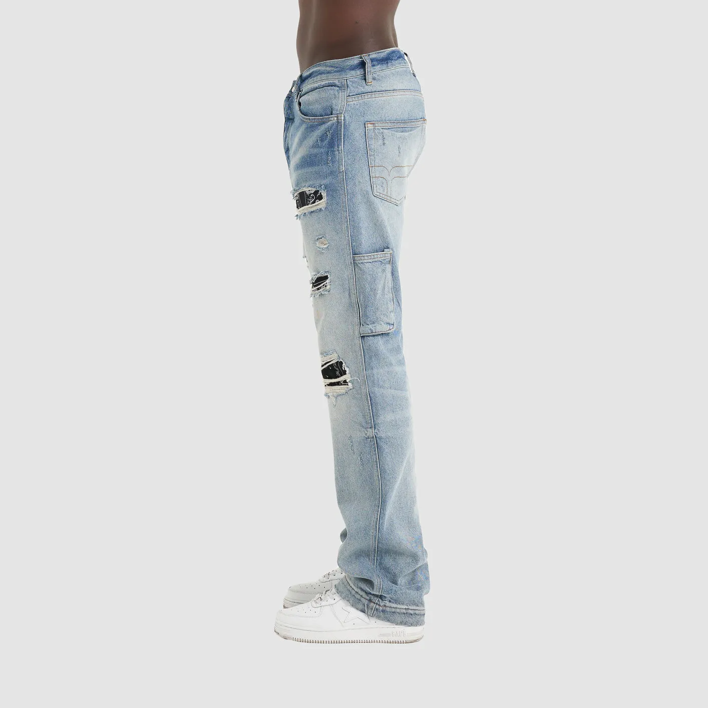 DISTRESSED DENIM PANTS