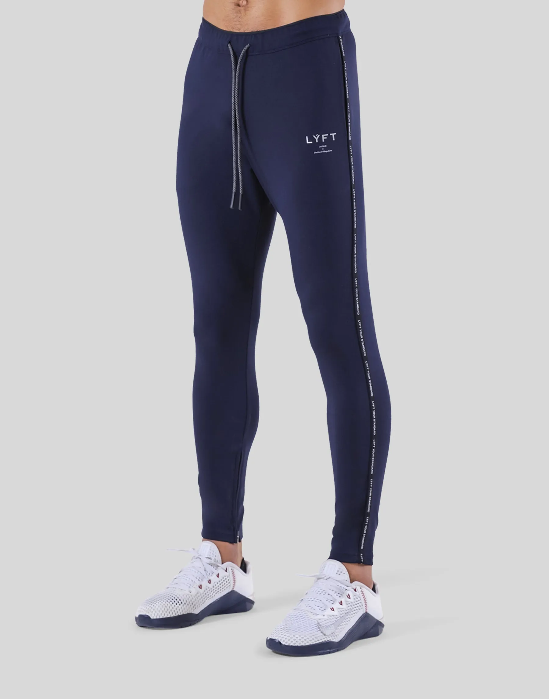 Logo Line Stretch Pants - Navy