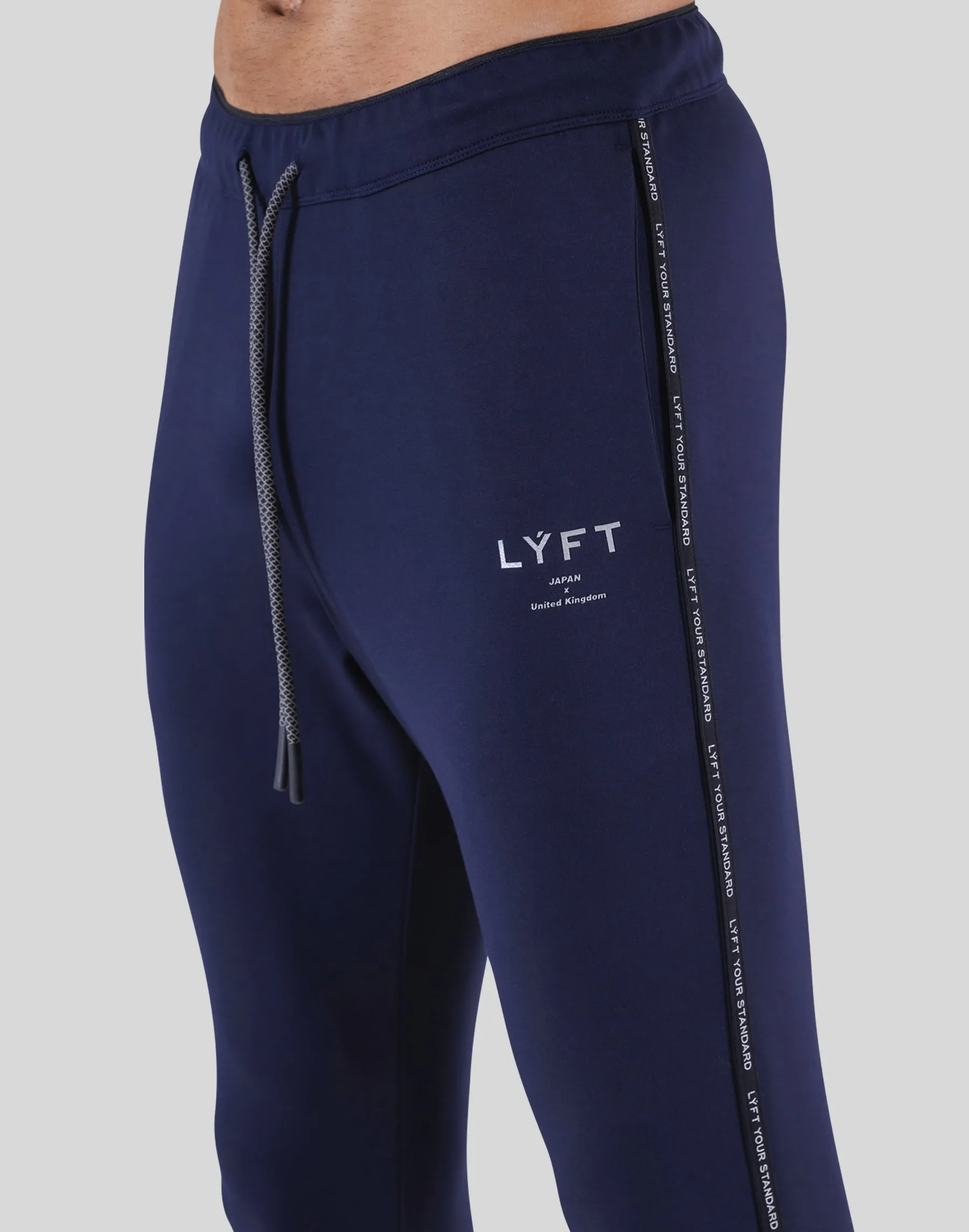 Logo Line Stretch Pants - Navy